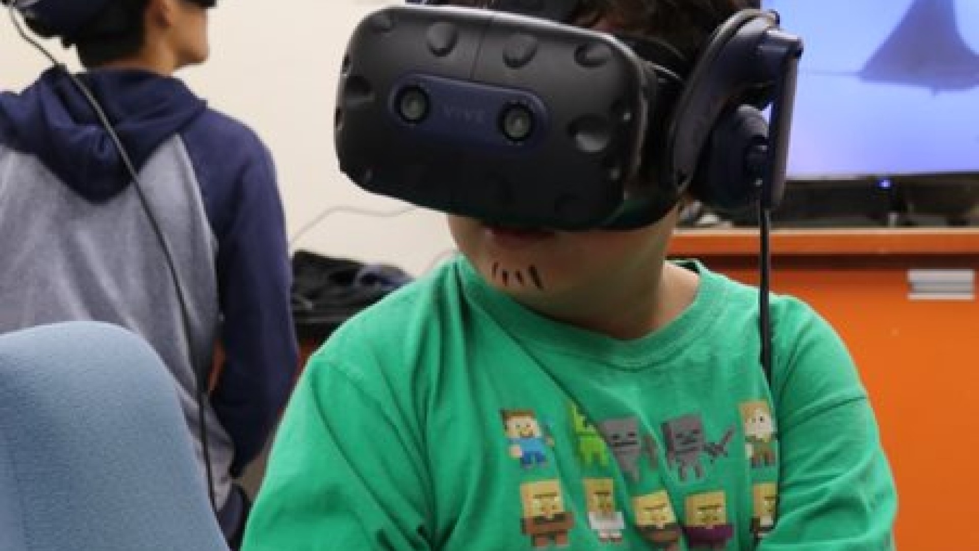 Students wearing VR headsets