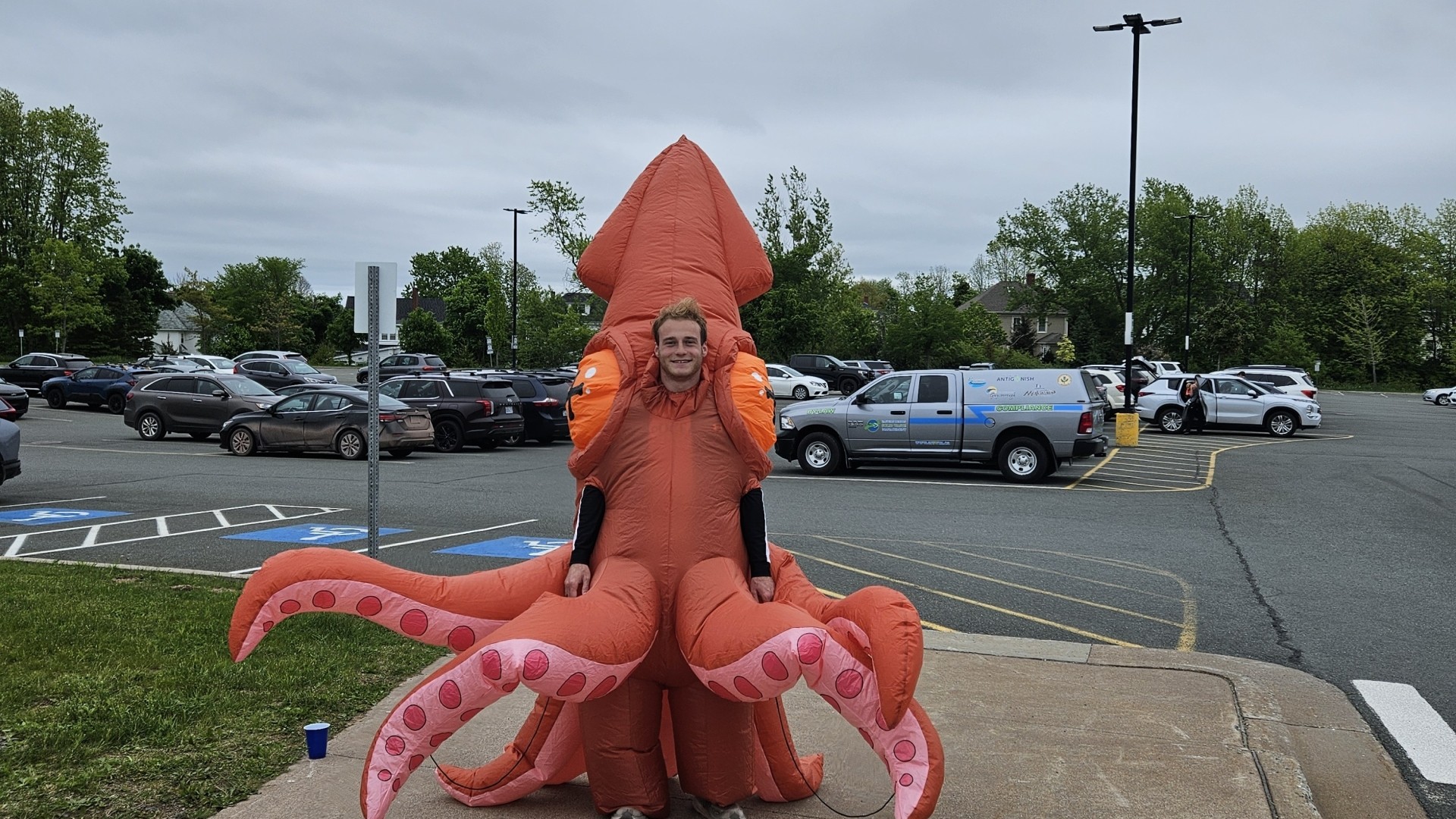A squid mascot at World Oceans Day 2024