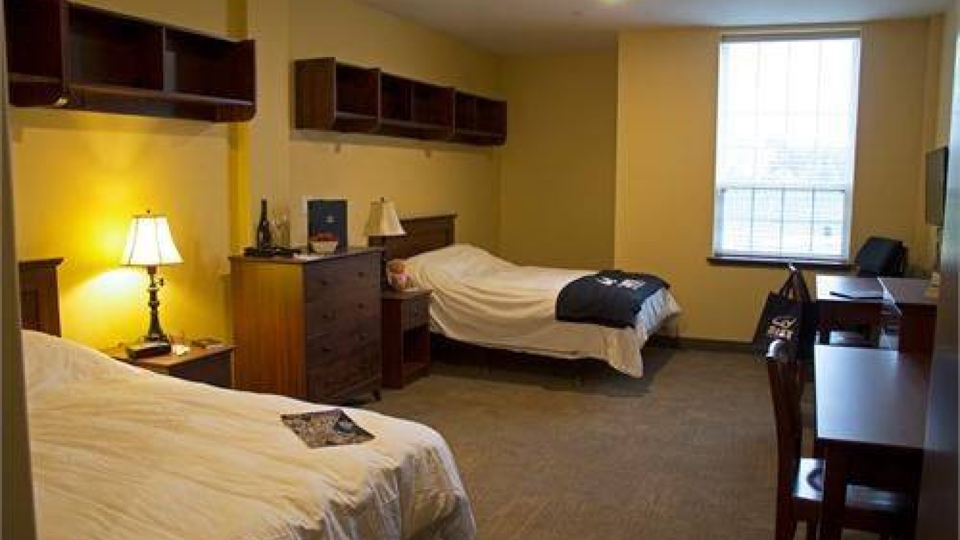 Double suite in Riley Hall with two double beds, desks and dressers 