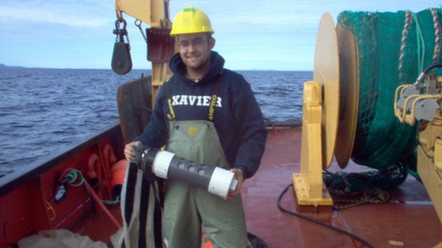 Program Graduate on a Boat