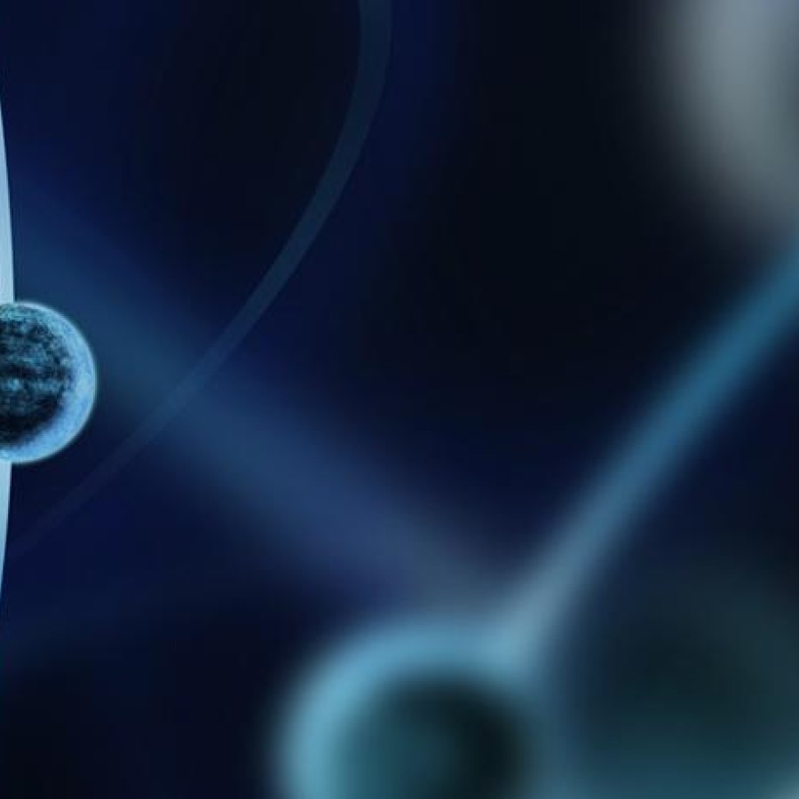 Atoms flying on a blue-black background