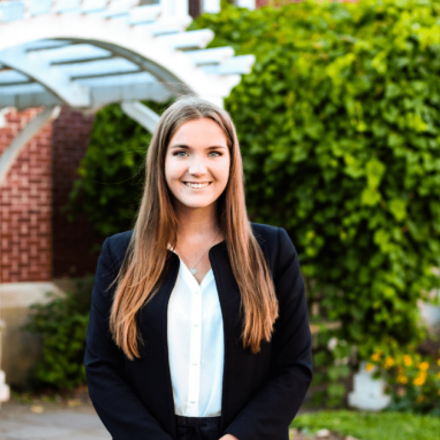 Mairi MacKinnon standing in front of building