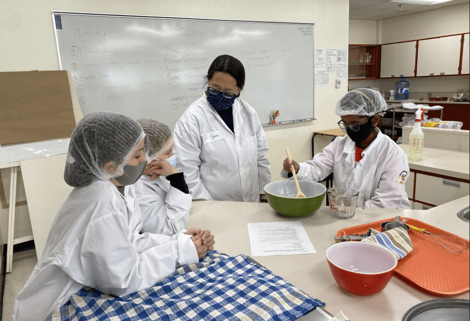 School Students Preparing Pizza Dough