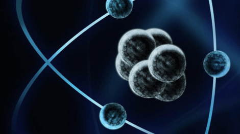 Abstract illustration of an atom with a nucleus and orbital electrons representing Physics