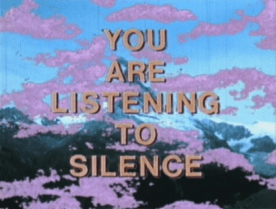 The words "Your are listening to silence" over a mountainous skyline with pink clouds.