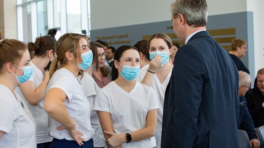 Premier Tim Houston speaking with a group of students