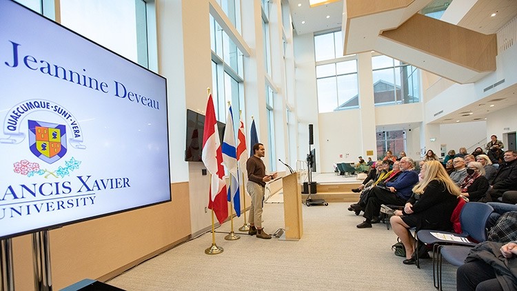 StFX student Marcel Desmond speaking at Jeannine Deveau Celebration of Life