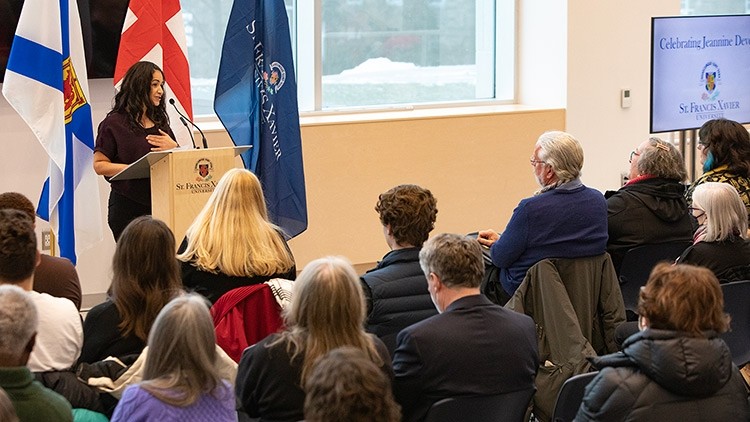 Terena Francis speaking at the Jeannine Deveau Celebration of Life