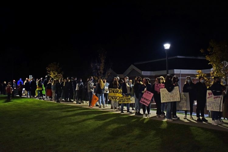 Students outside during Take Back the Night 2021