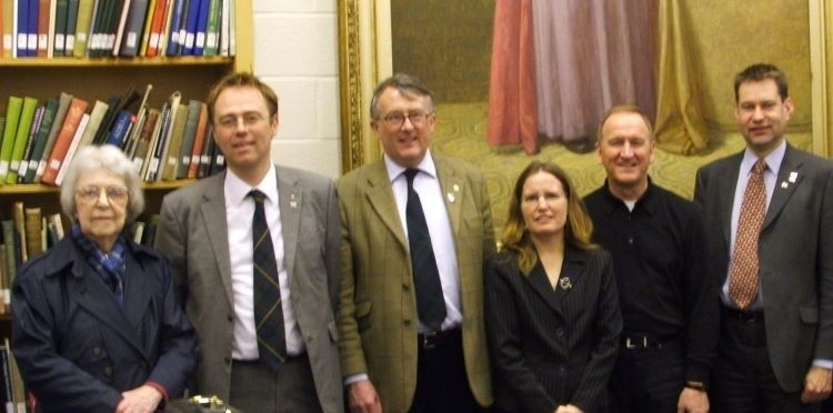 Special Collections Librarian Susan Cameron and Sr. Margaret MacDonell with members of the Scottish Parliament