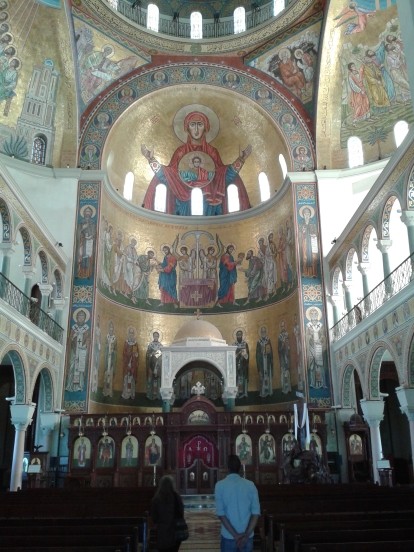 Interior of a church with intricate painting.
