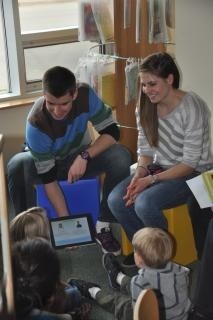 Teachers interacting with students