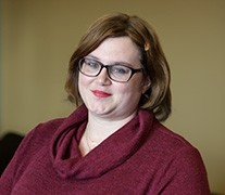 Portrait of person wearing glasses and smiling