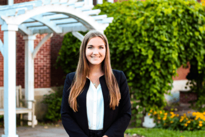 Mairi MacKinnon standing in front of building