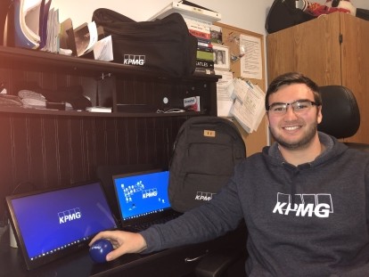 Co-op student sitting at KPMG desk