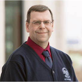 Headshot of Dr. Greg Tkacz
